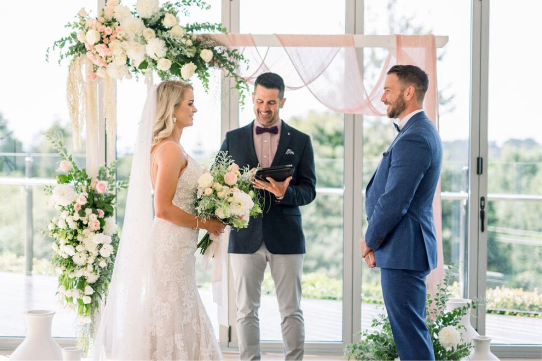 The Glasshouse at Hampton Estate Wines with bride and groom